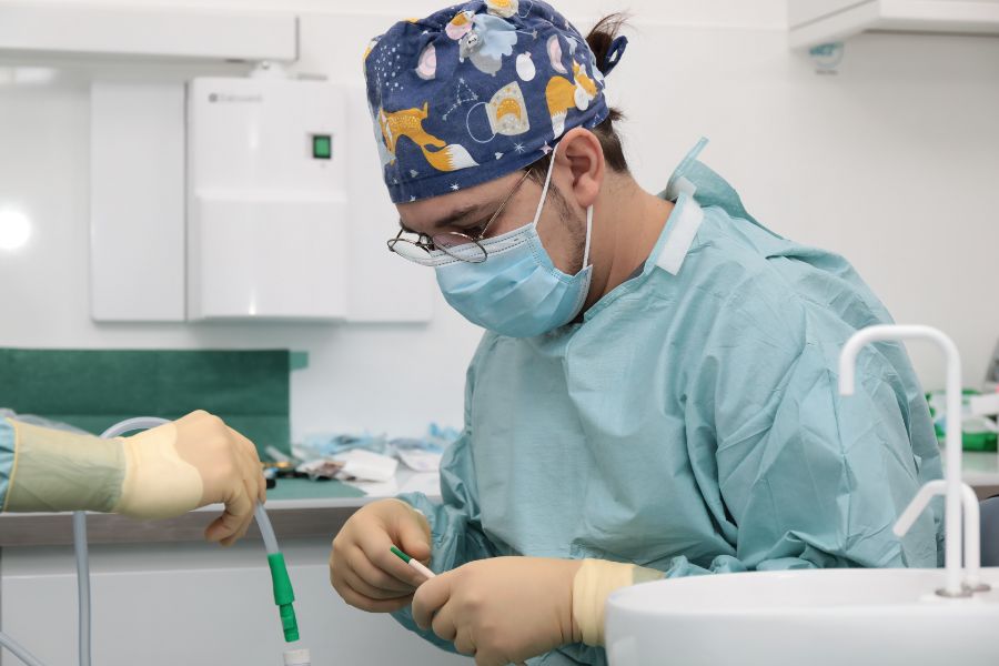 Dr Eric Battista placing a dental implant