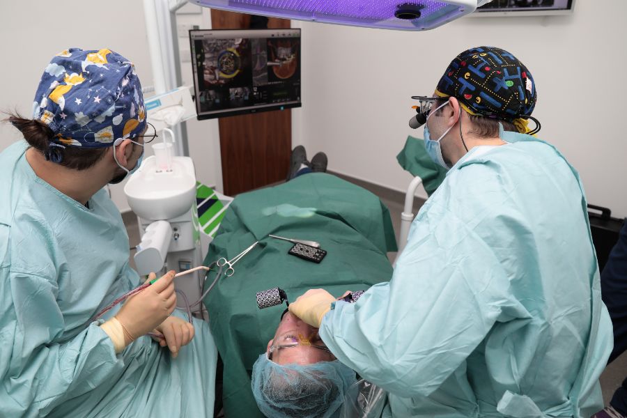 Dr Eric Battista and his surgical team