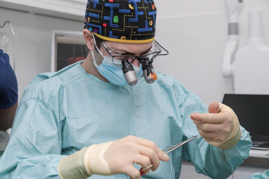 Dr Eric Battista during periodontal surgery