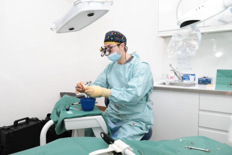 Dr Eric Battista preparing the surgical field for immediate implants