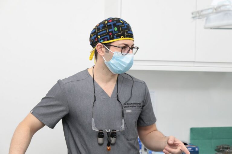Dr Eric Battista during surgery to place dental implants